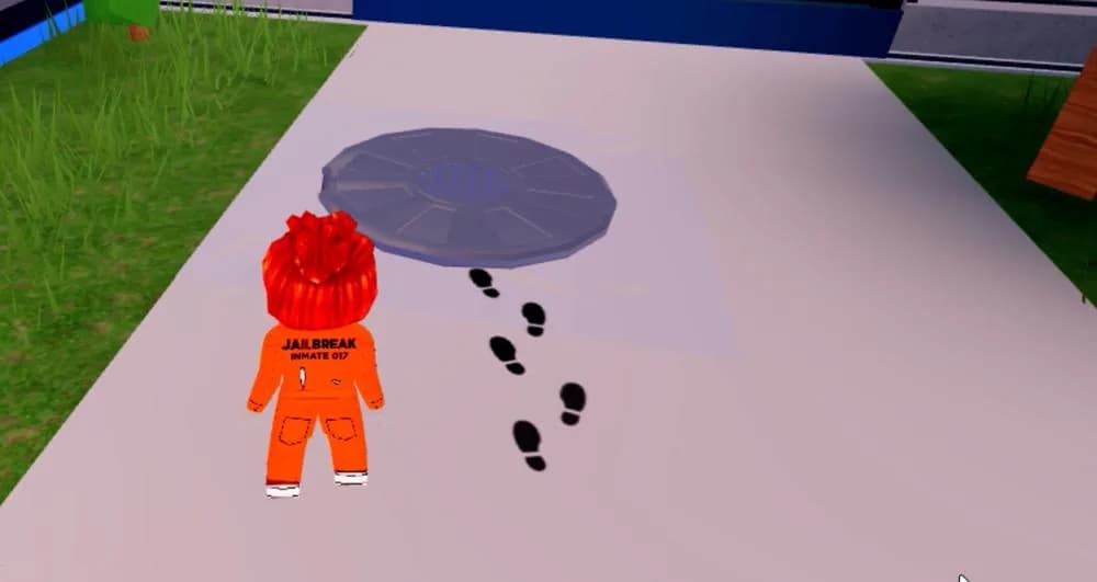 Jailbreak: footprints on the floor lead the character to a hatch